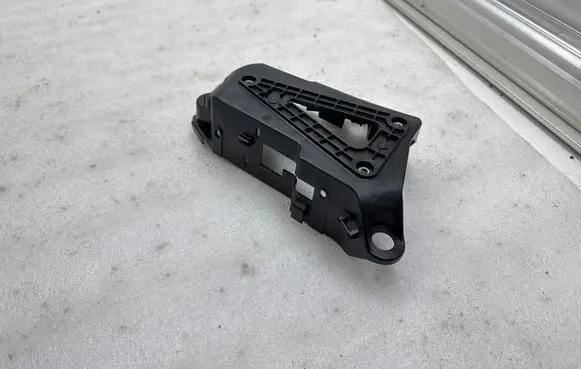 Tesla Model X Pneumatic air compressor holding bracket 104491900E 120977