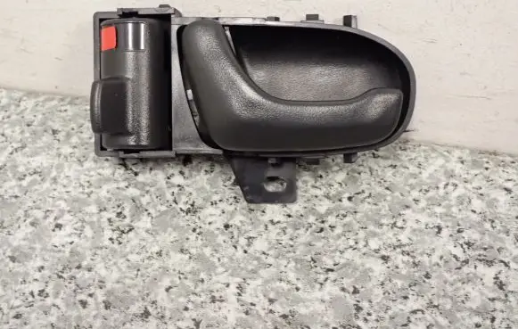 Suzuki Swift I Front door interior handle 