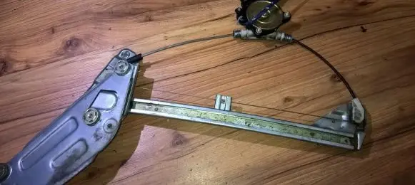 Mazda 323 F Sliding door window regulator with motor