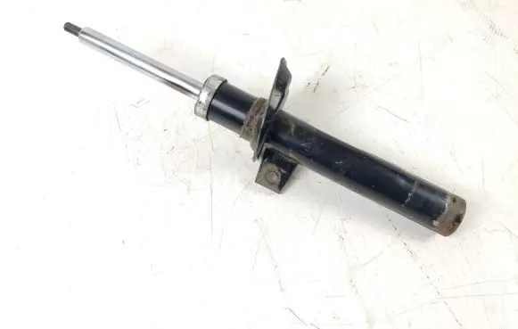 Volkswagen Caddy Front shock absorber/damper
