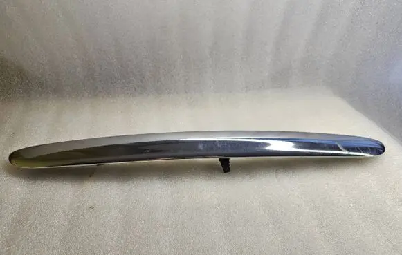 Trunk door license plate light bar