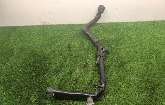 Volkswagen Golf VI Engine coolant pipe/hose 03L121065AJ