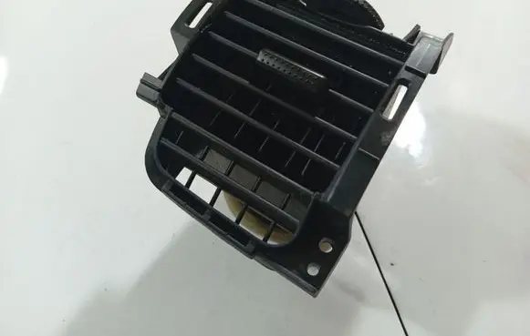 Dash center air vent grill