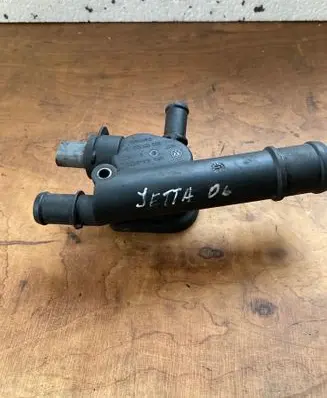 Thermostat/thermostat housing