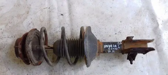 Subaru Impreza II Front shock absorber with coil spring