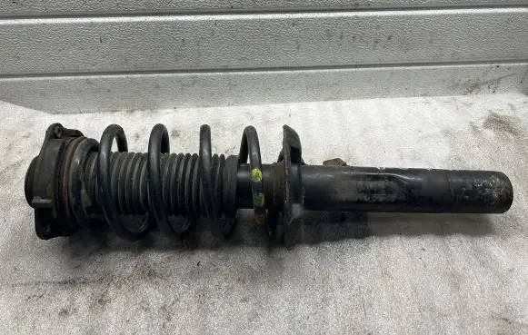 Volkswagen PASSAT B6 Front shock absorber/damper 1K0412331C