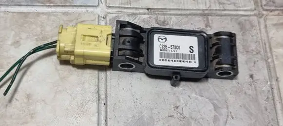 Mazda 5 Airbag deployment crash/impact sensor C23557KC0 W002T11771