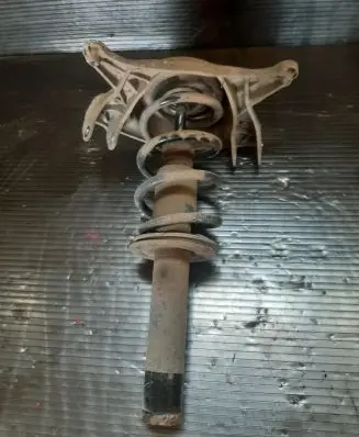 Front shock absorber with coil spring