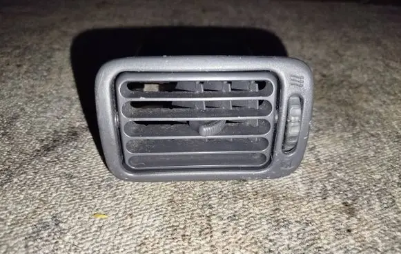 Toyota Corolla E110 Dashboard side air vent grill/cover trim 5567012270