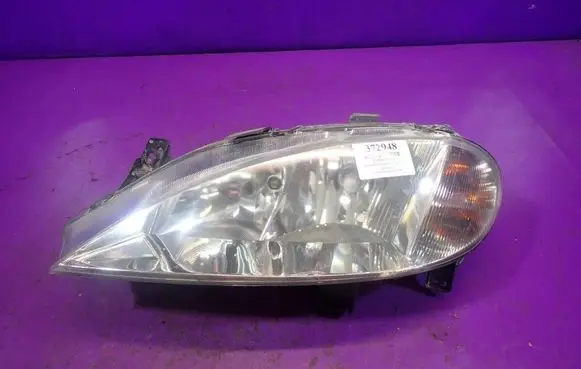 Renault Megane I Headlight/headlamp 7700427874G