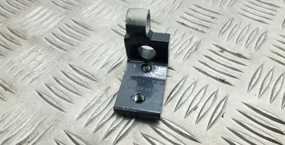 Rear door upper hinge