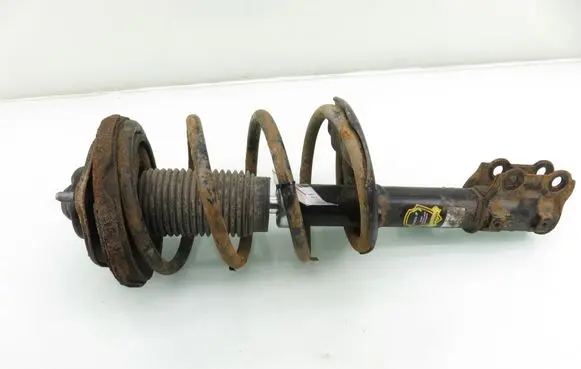 KIA Carens III Front shock absorber with coil spring 614024JP