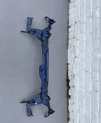Top upper radiator support slam panel
