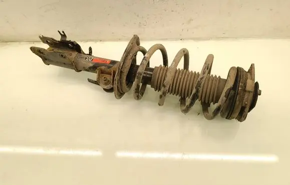 Nissan Qashqai+2 Front shock absorber with coil spring JGM1081T