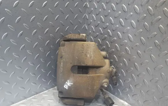 Volkswagen Jetta VI Front brake caliper 1K0615123E
