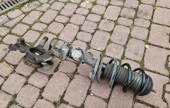 Opel Adam Front shock absorber with coil spring 13450452