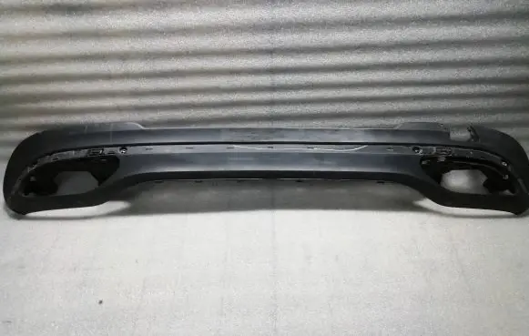 Rear bumper trim bar molding