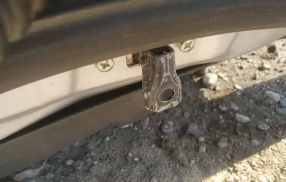 Mitsubishi Outlander Rear door check strap stopper