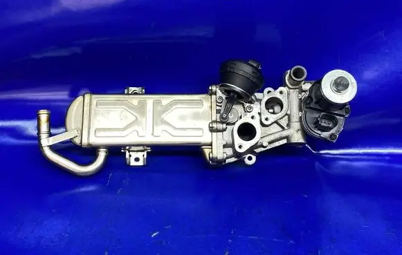 Volkswagen PASSAT B7 EGR valve cooler 709720000 23T168