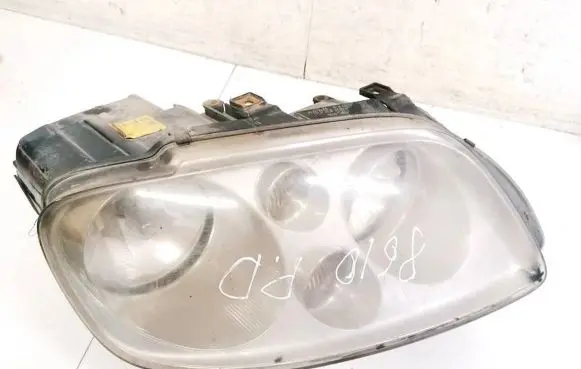Volkswagen Touran I Headlight/headlamp 0301205202