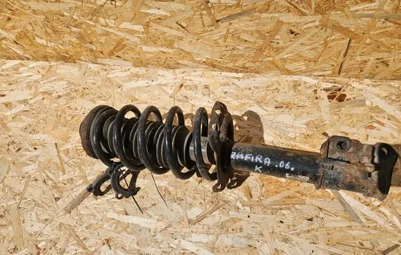 Front shock absorber with coil spring