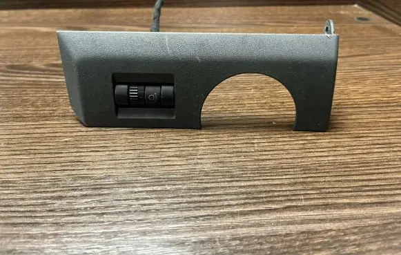 Headlight level height control switch