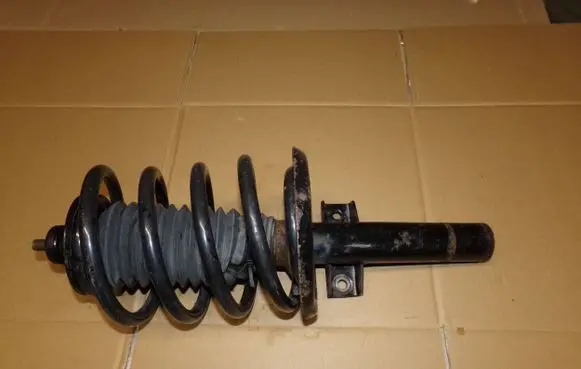 Volkswagen Sharan Front shock absorber with coil spring