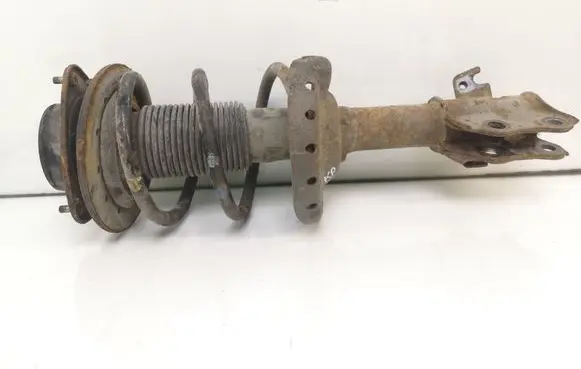 Subaru Impreza III Front shock absorber with coil spring 20310FG230