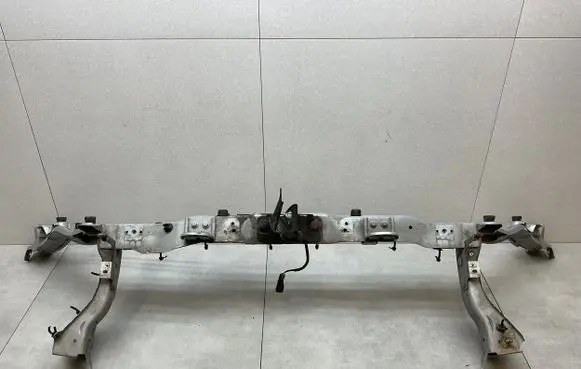 Top upper radiator support slam panel
