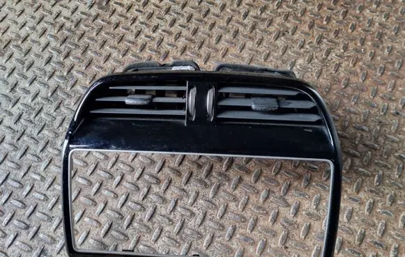 Jaguar XE Dash center air vent grill GX73014L21BE