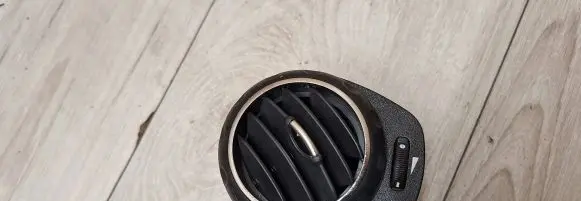 Dash center air vent grill