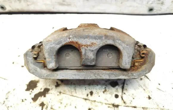 Ford Taurus Front brake caliper AG132811979