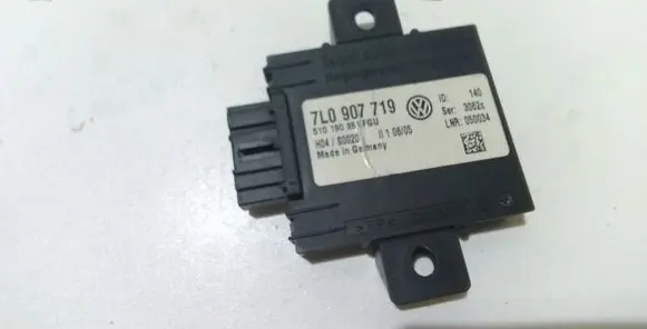 Volkswagen Touareg I Alarm control unit/module 7L0907719