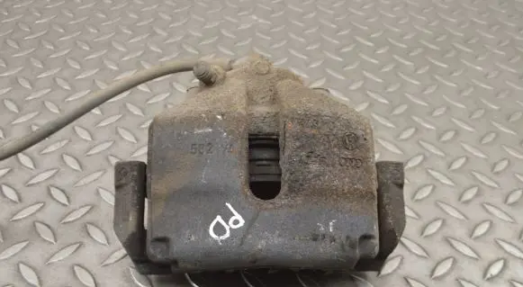 Volkswagen Golf VII Front brake caliper