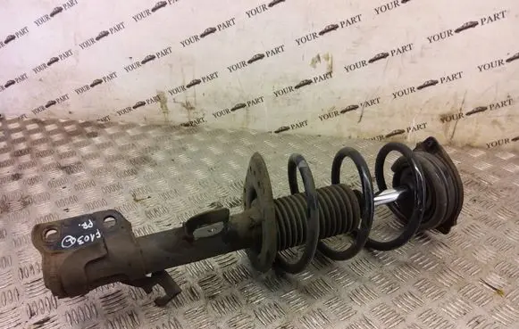 Nissan Juke I F15 Front shock absorber with coil spring 54303BX86A