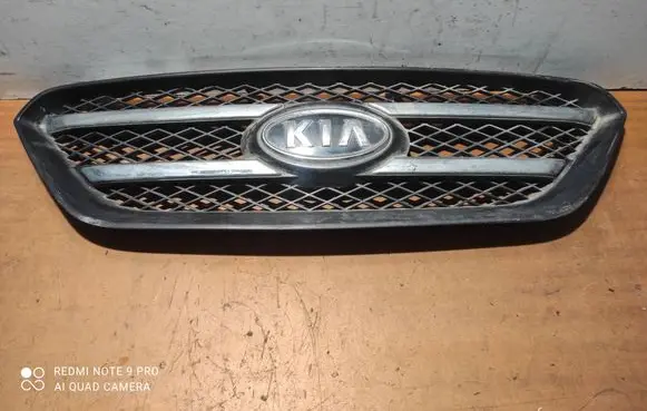 KIA Carens II Front grill 8638010000