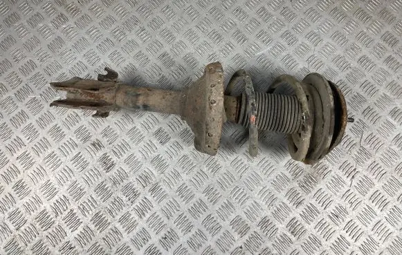 Subaru Outback Front shock absorber with coil spring