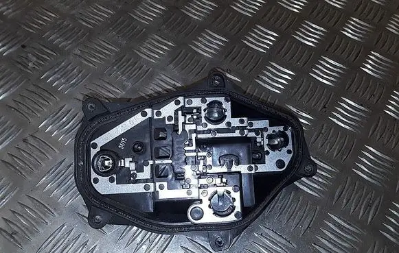 Tail light bulb cover holder