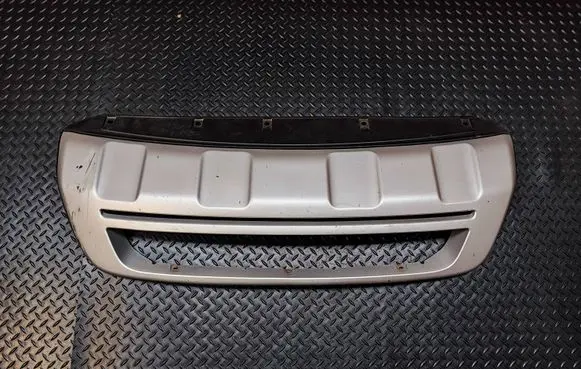 Renault Koleos I Front bumper lip 7711423553