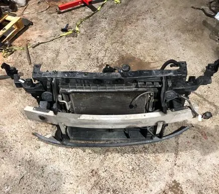 Radiator support slam panel