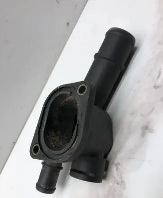 Thermostat/thermostat housing