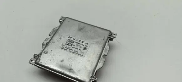 Volkswagen Tiguan Headlight ballast module Xenon 7PP941572AB W003T25075 7PP941572A