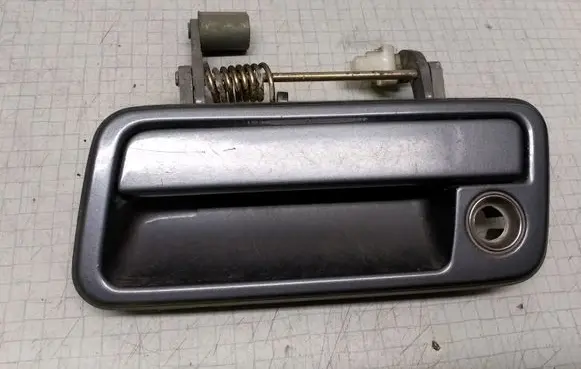 Mazda 323 F Front door exterior handle