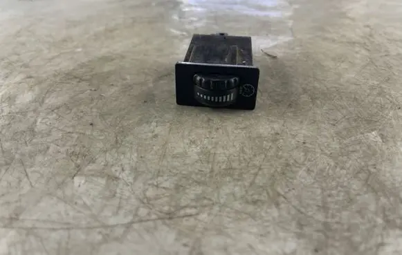 Panel lighting control switch