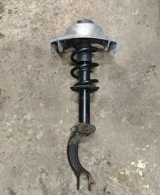 Front shock absorber with coil spring