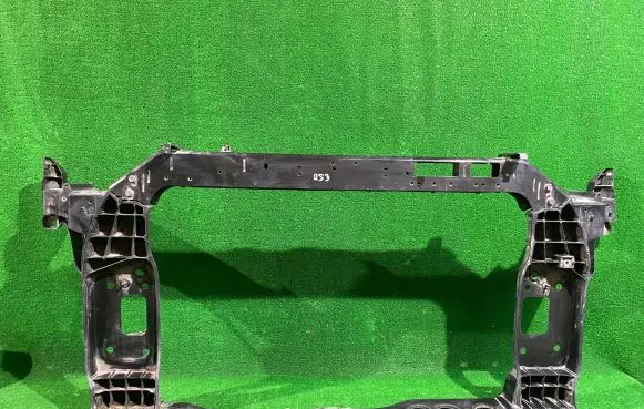 Radiator support slam panel