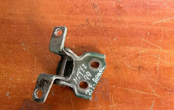 Front door lower hinge