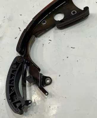 Volkswagen Touareg II Timing belt tensioner 