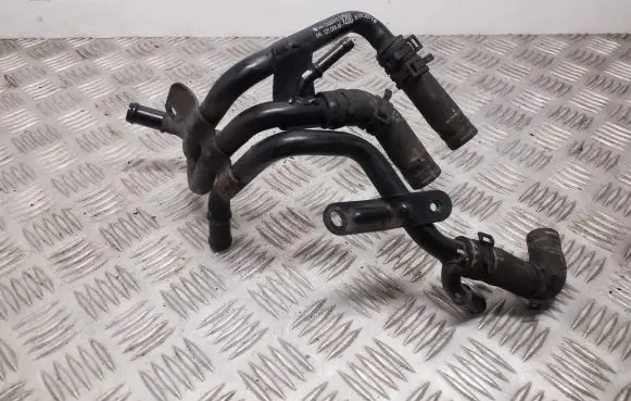 Volkswagen Golf VII Engine coolant pipe/hose 04L121064AF