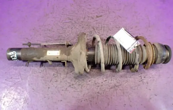 Volkswagen Golf IV Front shock absorber with coil spring 1J0413031S